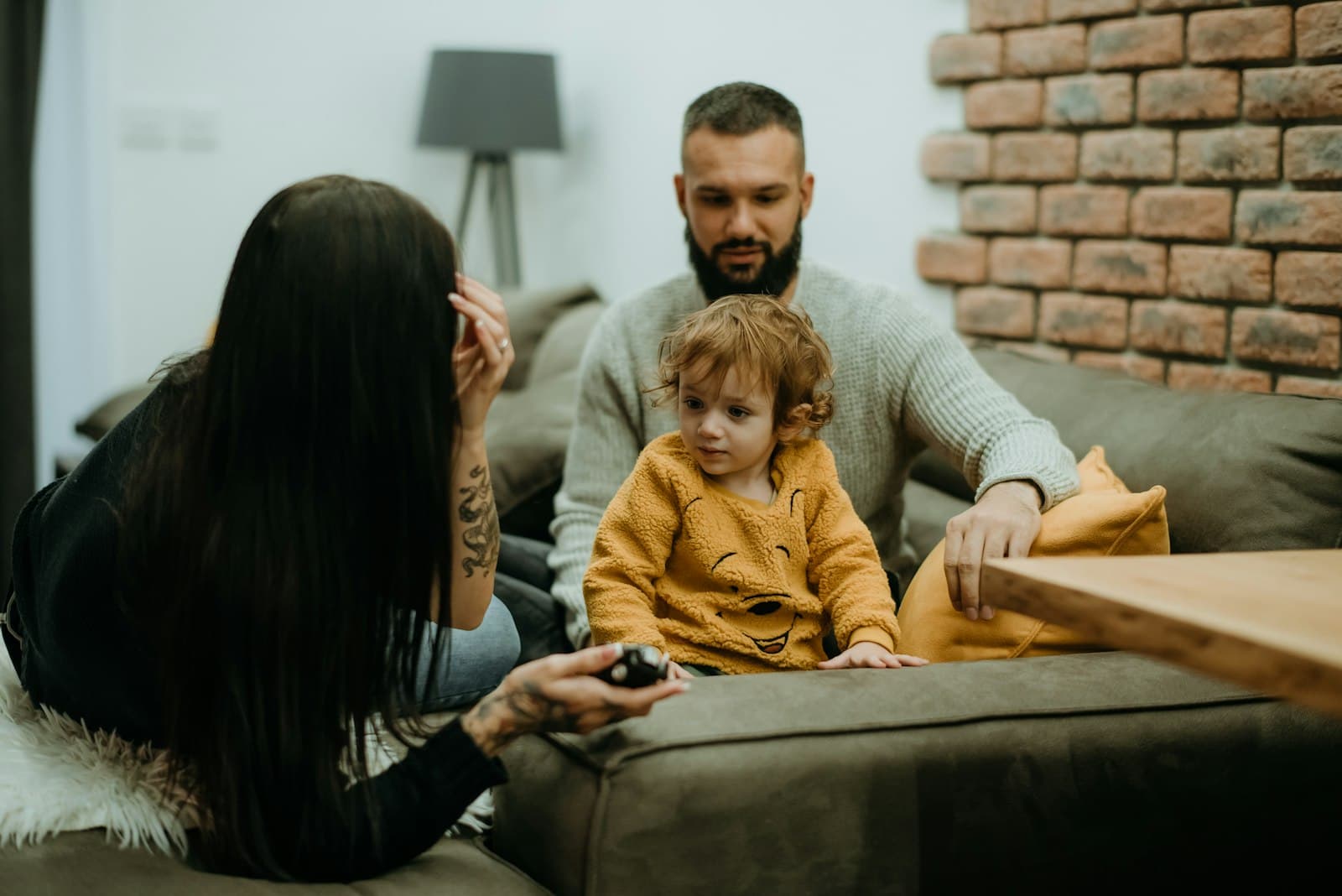 Family relaxing at home after a fast emergency plumbing repair