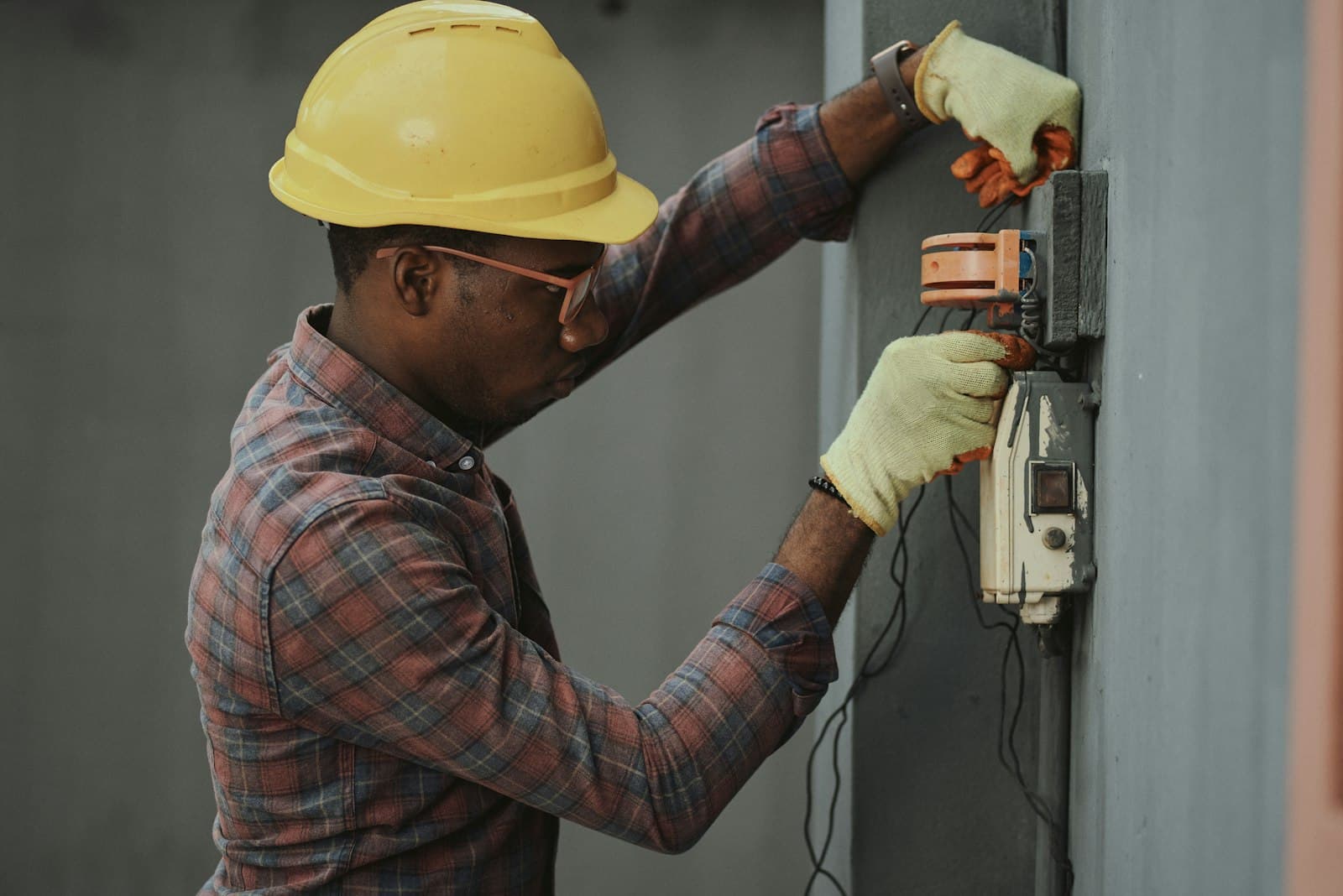 MainLine Plumbing technician clearing a clogged drain line